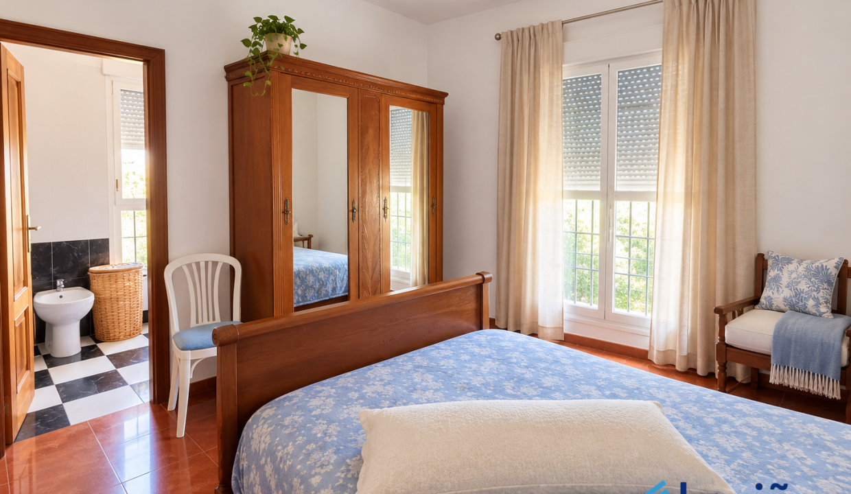 Dormitorio luminoso y ordenado